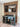 Living room with reclaimed wood beams and fireplace